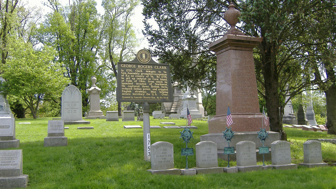 Photograph of the George Rogers Clark Memorial at Cave Hill Cemetery, featuring the prominent statue and surrounding landscaped grounds